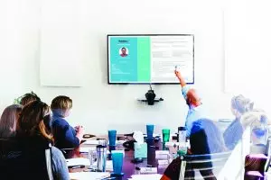 user experience persona focus group sits around a table together