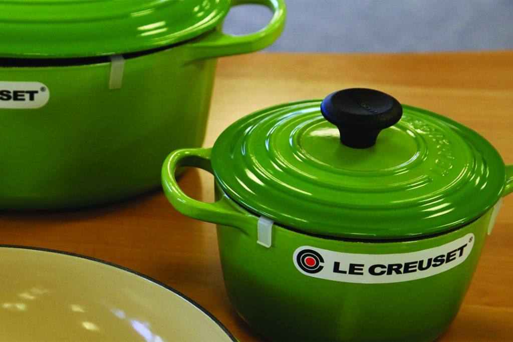 Le Creuset enamel cookware on a countertop
