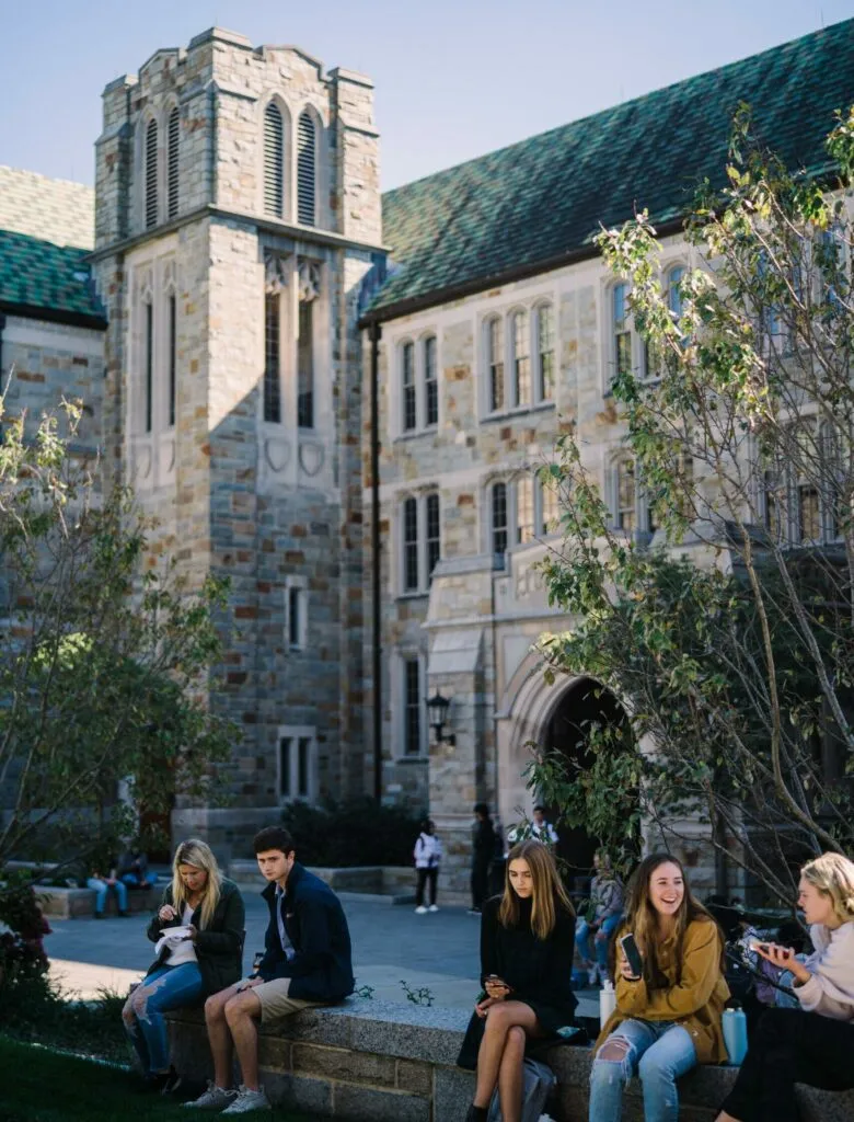 students relax on their college campus