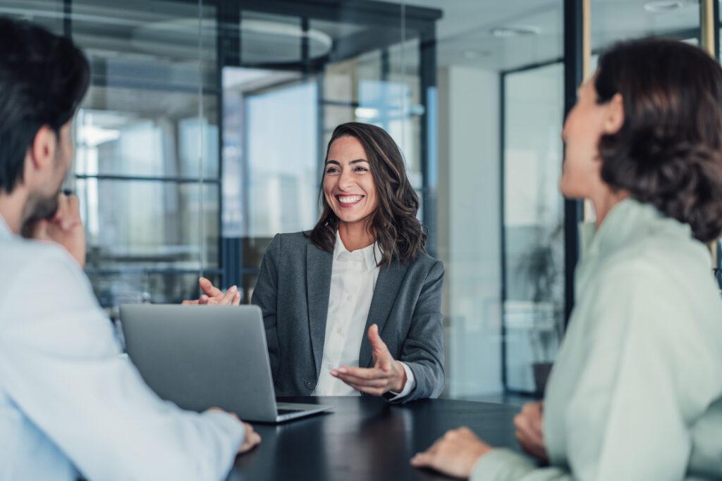 Banking customers speak with a financial advisor.